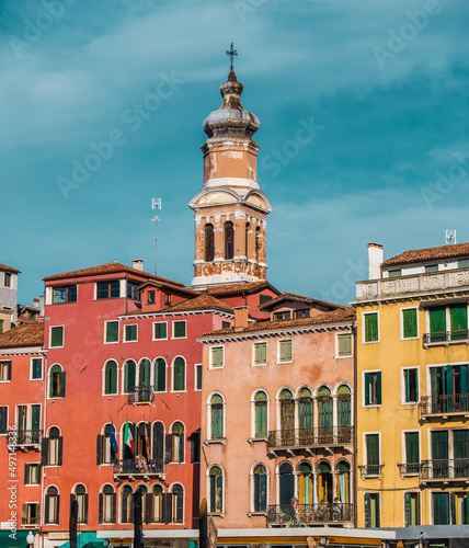 View of Church bell between buildings in Venice, Italy