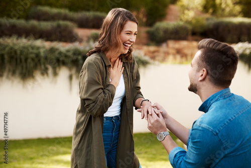 I cant imagine my life without you. Cropped shot of a young man proposing to his girlfriend. photo