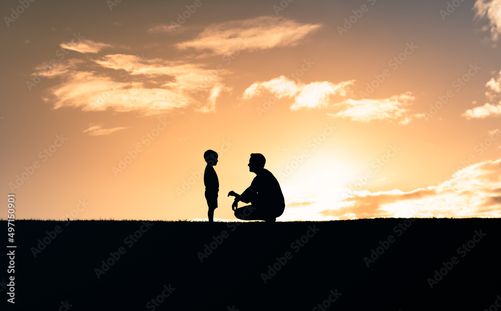 Father son relationship concept. Father having a talk with his son child spending time together. 