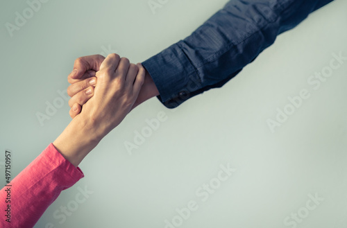 Helping hand giving support and assistance to someone in need 