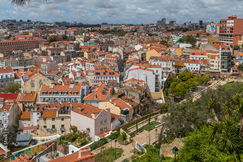 Panoramic cityscape of Lisbon, cityscape with historic and traditional architecture in sunny day in late European winter.