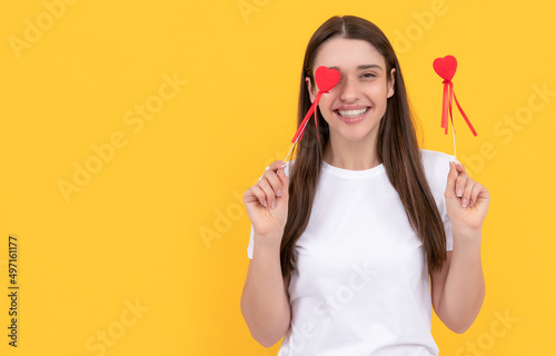 be my valentine. girl with love symbol on yellow background. love romantic gift.