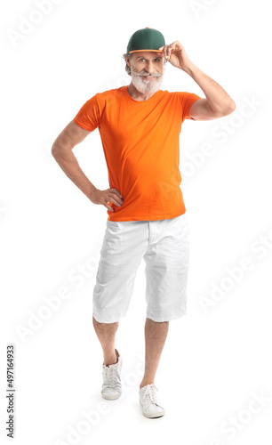 Cool mature man on white background © Pixel-Shot