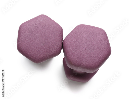 Stylish purple dumbbells on white background