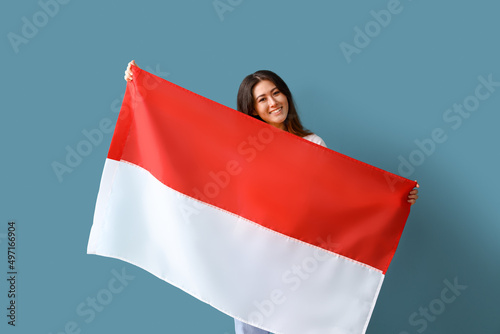 Young Asian woman with flag...