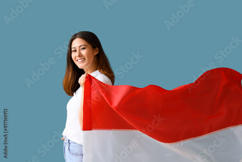 Young Asian woman with flag...