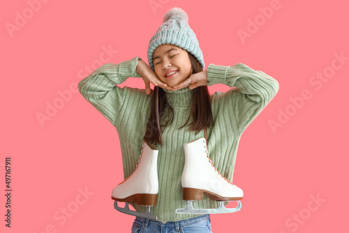 Little Asian girl in warm c...