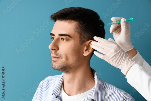 Handsome man with hair loss...