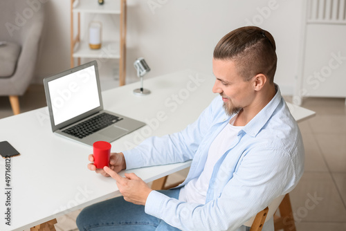 Man turning on wireless por...