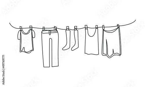 Continuous one line drawing of laundry hang on clothline. Vector illustration