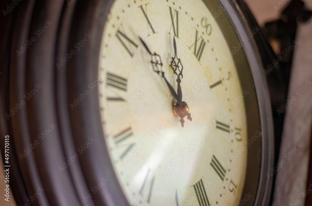 Round clock hanging on the wall Round clock hanging on the wall