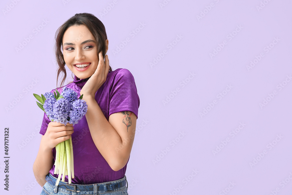 Pretty young woman with hyacinth flowers on color background Pretty young woman with hyacinth flowers on color background