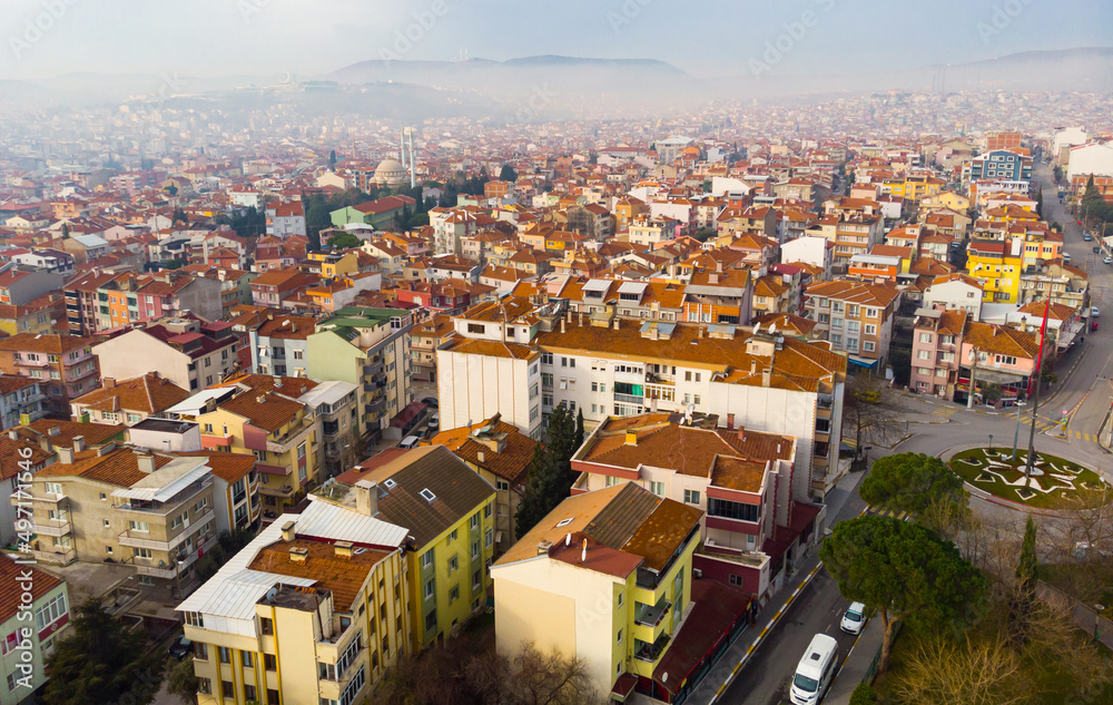 View from drone of residential districts of Turkish city of Balikesir in hazy winter day, Marmara Region.