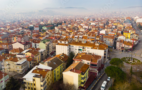 View from drone of residential districts of Turkish city of Balikesir in hazy winter day, Marmara Region.