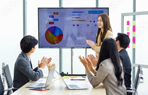 Billede på lærred Asian young pretty professional successful businesswoman staff standing greeting