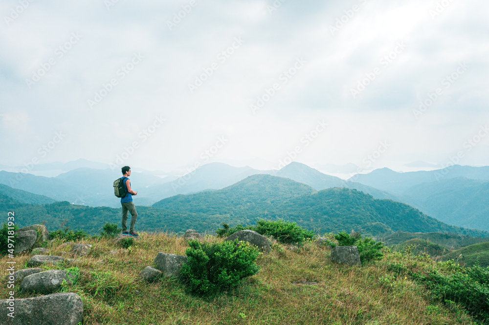 Man hiking in mountain, Autumn, Sai Kung