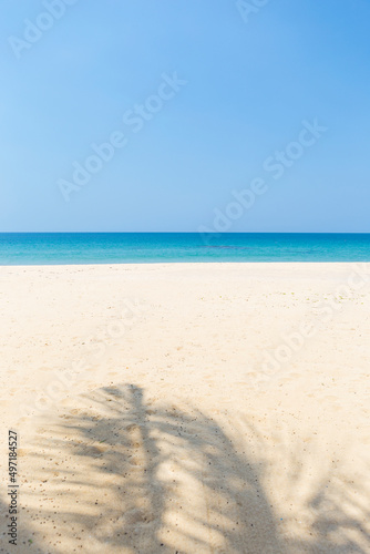 Sandy beach on tropical island, summer outdoor day light, vertical style