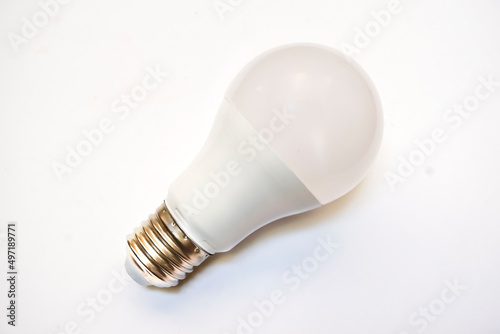 light bulb Led​ isolated on white. Energy consumption and graphic concept.  photo
