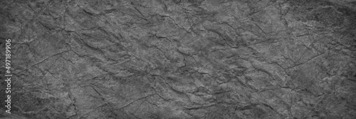 Panel kuchenny z motywem Black white rock texture. It looks like a rough concrete wall surface. Dark gray stone grunge background with space for design. Wide banner. Panoramic. Backdrop.