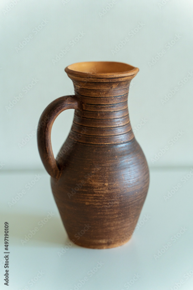      Ceramics, a ceramic product made with your own hands, made on a potter's wheel, a jug, a mug, clay. 