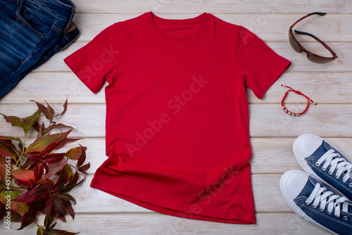 Mens red T-shirt mockup with wild grass and bracelet