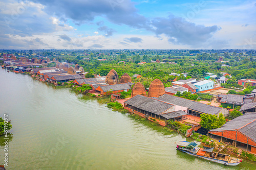 Aerial view of Mang Thit brick kiln in Vinh Long. Burnt clay bricks used in traditional construction of Vietnamese photo