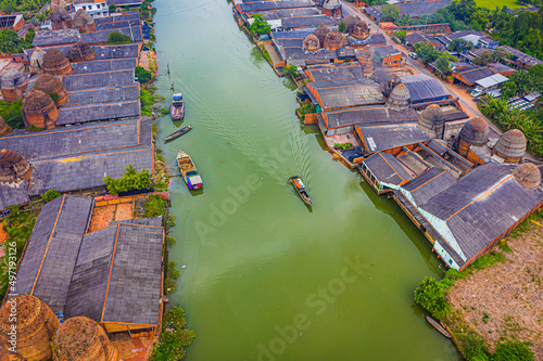 Aerial view of Mang Thit brick kiln in Vinh Long. Burnt clay bricks used in traditional construction of Vietnamese photo