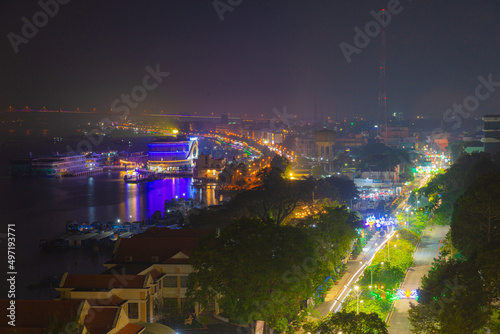 View of My Tho city, Tan Long island and marina, Rach Mieu bridge with transportation, energy power infrastructure in Mekong Delta, day and night.