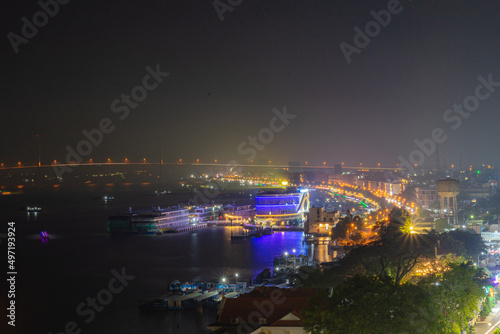 View of My Tho city, Tan Long island and marina, Rach Mieu bridge with transportation, energy power infrastructure in Mekong Delta, day and night.