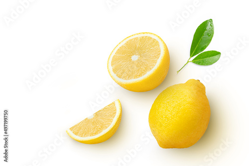 lemon with leaves on white.