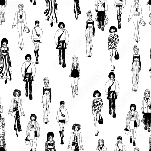 Seamless pattern. Women in trendy clothes. Defile sketch.