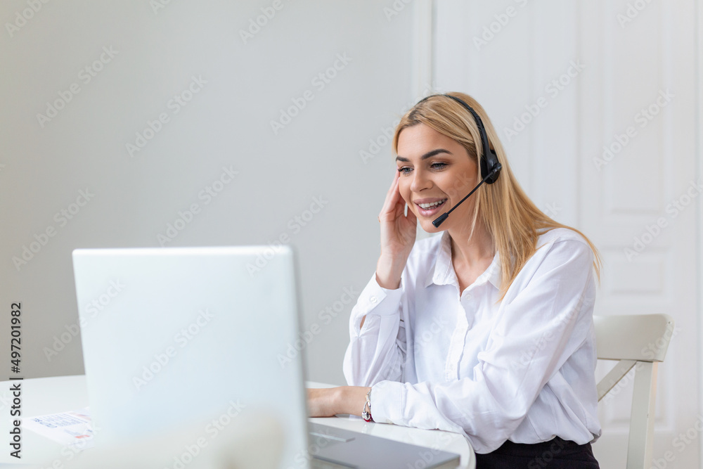 Young friendly operator woman agent with headsets. Beautiful business woman wearing microphone headset working in the office as a telemarketing customer service agent, call center job concept. Young friendly operator woman agent with headsets. Beautiful business woman wearing microphone headset working in the office as a telemarketing customer service agent, call center job concept.