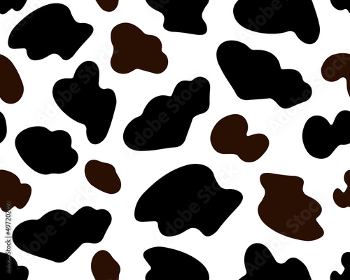 Cow brown and black seamless pattern. Ideal for printing on wallpaper, fabric, packaging. To use the web page background, surface textures. Abstract vector spots. 