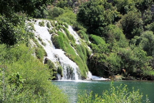 large lake with a waterfall in the Krupa river  Croatia