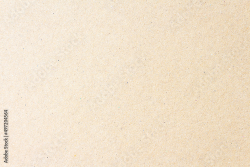 White beige paper background texture light rough textured spotted blank copy space background in beige yellow; brown
