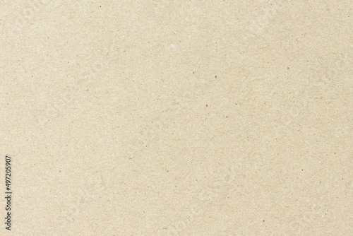 White beige paper background texture light rough textured spotted blank copy space background in beige yellow,brown