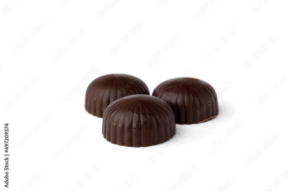 Chocolate sweets with filling isolated on white background. Chocolate sweets with filling isolated on white background.