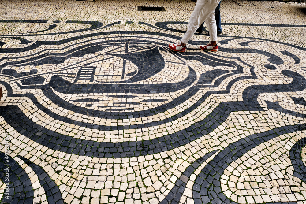 Portuguese pavement of black basalt and white limestone in Porto, Portugal