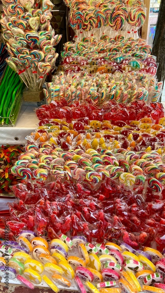 Different sweets on the counter are laid out all the colors of the rainbow as much as the saliva flows from jelly figurines to pasta and chocolate. High quality 4k footage