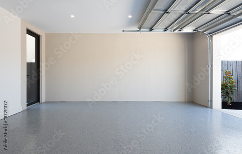 Fotografie, Obraz Home garage interior background with open door