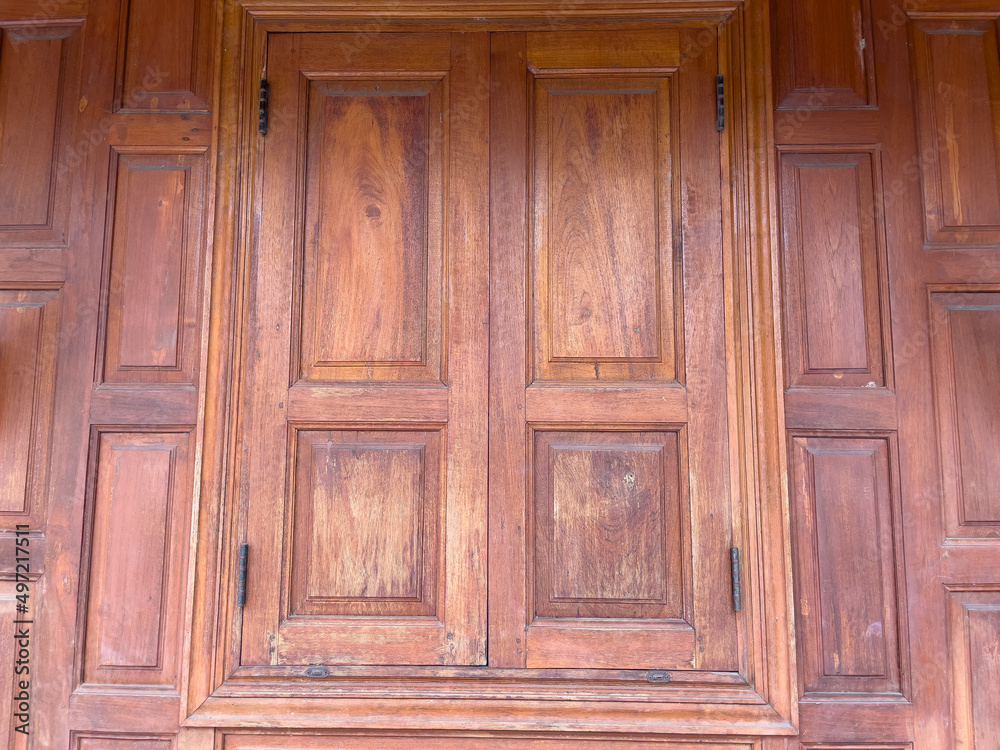 old wooden door with shutters