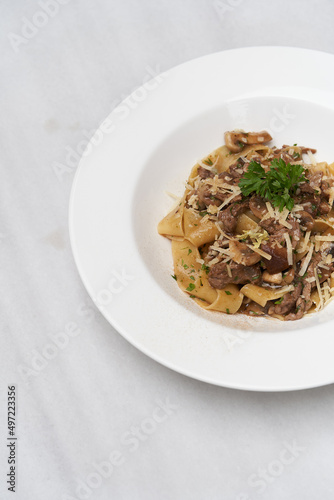 Fettuccine pasta with beef and parmesan cheese