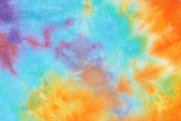 Abstract tie dye multicolor fabric cloth Boho pattern texture for background or groovy wedding card, sale flyer, 60s, 70s poster, kid tie-dye diy backdrop. Modern Watercolor Wet Brush Fabrics Art