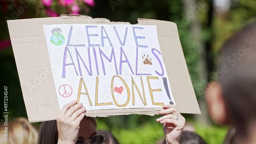 animal rights. Stop Animal Abuse. Vegans are against eating animals. Animal advocates against animal testing of cosmetics. Demonstration march crowd