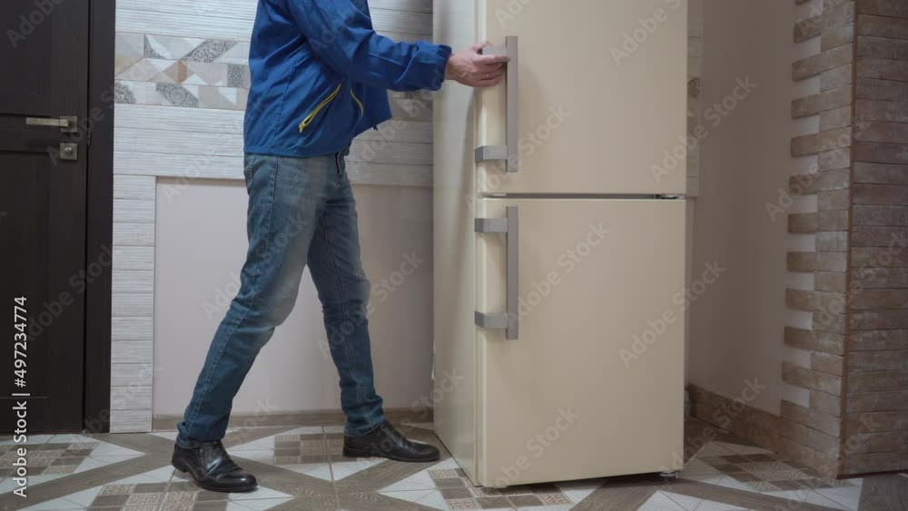 home appliance delivery service, courier delivered the refrigerator to the house, buying a new refrigerator home appliance delivery service, courier delivered the refrigerator to the house, buying a new refrigerator