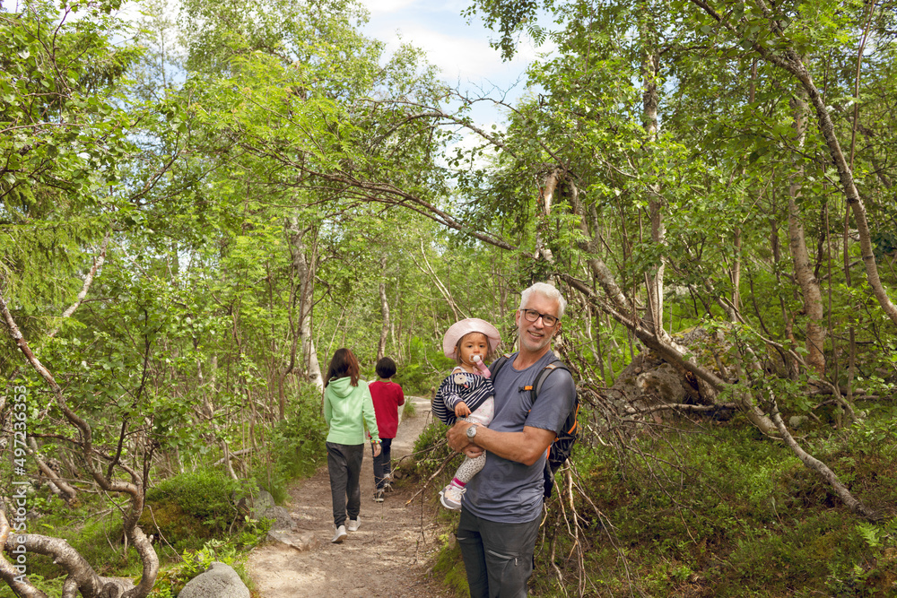 Father with toddler girl in forest Father with toddler girl in forest