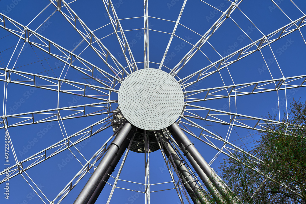 Ferris wheel on the background of a beautiful sky . Ferris wheel on the background of a beautiful sky .