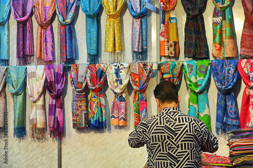 Multicolored pashmina scarves on display at an ethnic retail shop photo