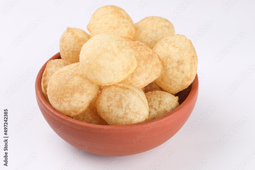 Panipuri or Golgappa is a popular street snack from India. It's a round, hollow puri filled with a mixture of flavoured water and other chat items