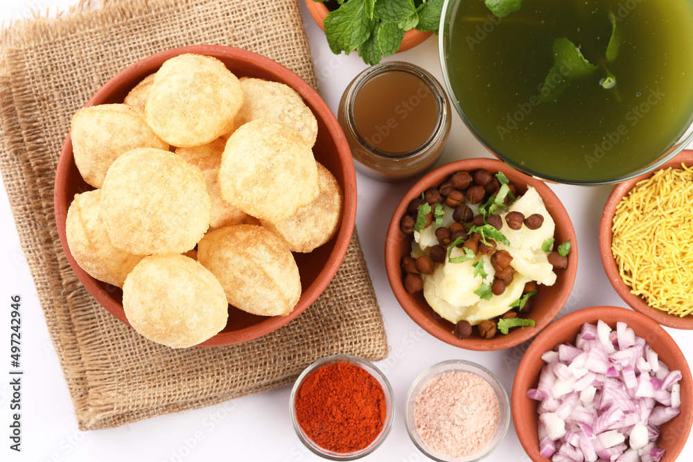 Panipuri or Golgappa is a popular street snack from India. It's a round, hollow puri filled with a mixture of flavoured water and other chat items